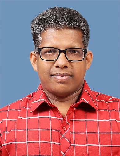 Com. Sumesh G